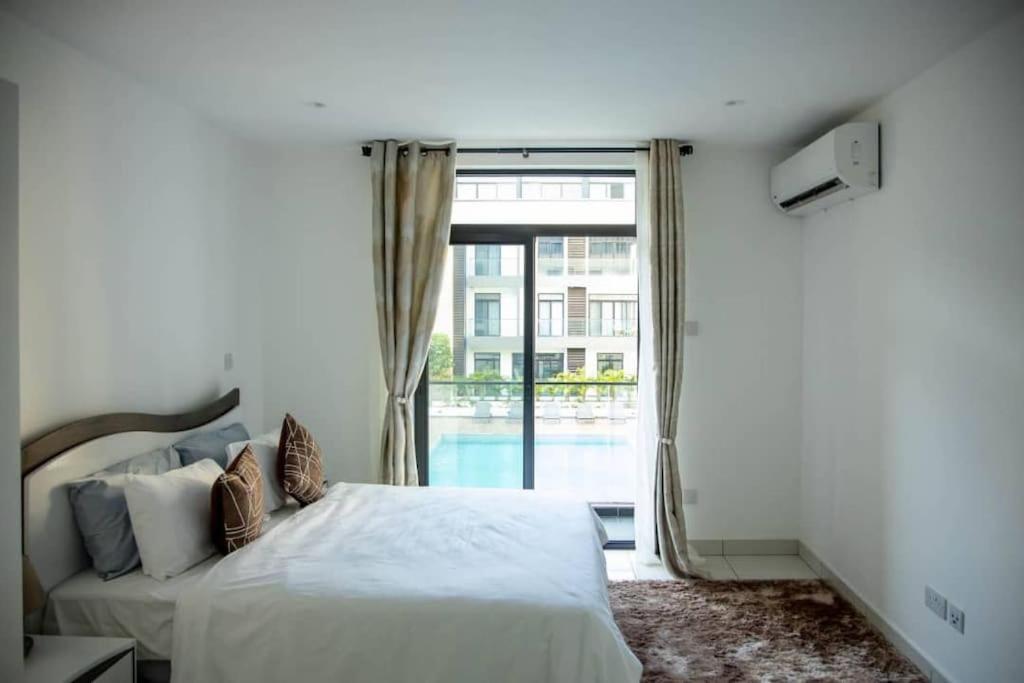 Pool View Apartment @Embassy Gardens อักกรา ภายนอก รูปภาพ